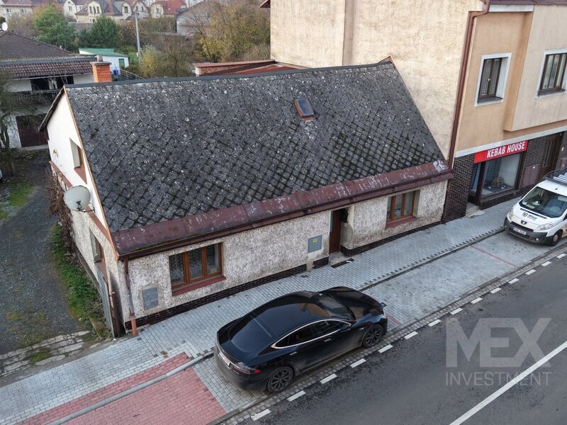 Rodinný dům s investičním potenciálem v centru Červeného Kostelce